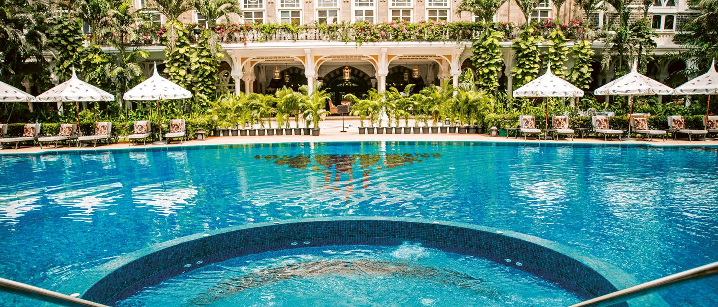 The inner courtyard of the Taj Mahal Palace Hotel with a pool