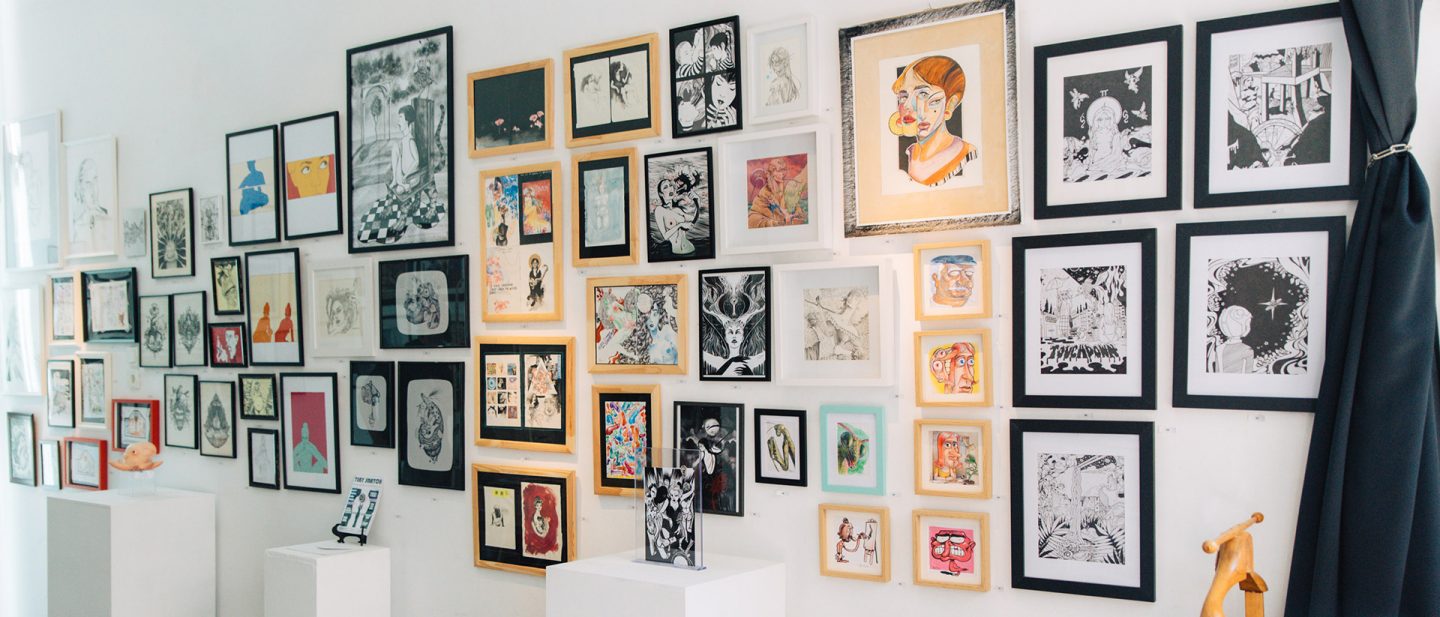 Wall with exhibits in the Delirium Athens gallery