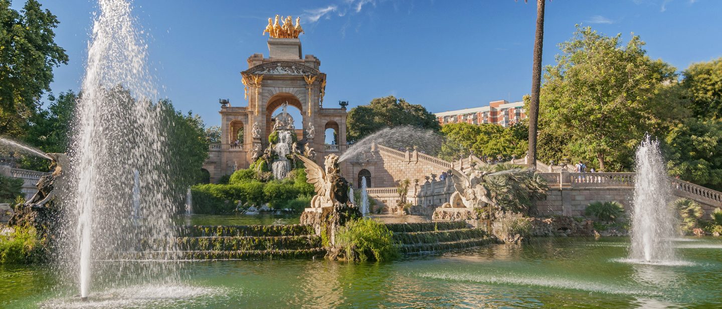 Fountain in Parc de la Ciutadella in Barcelona, surrounded by greenery and statues