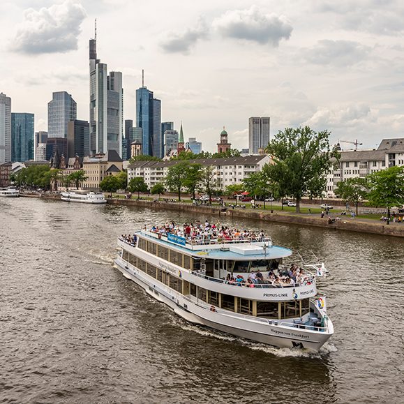 Museum embankment of the city of Frankfurt with an excursion boat on the Main