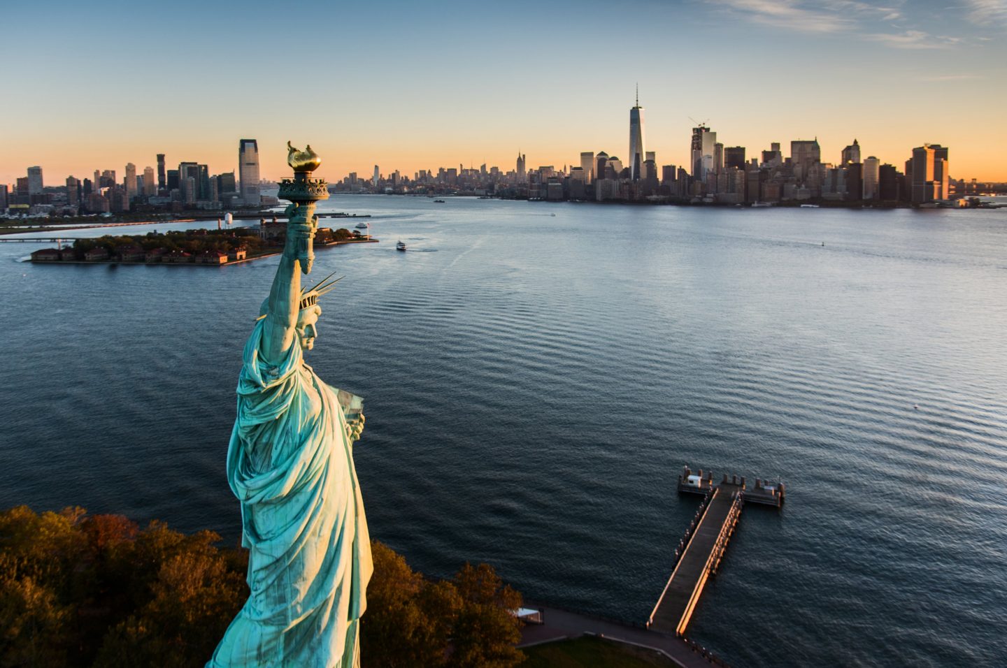 Statue of Liberty with the New York skyline in the background.