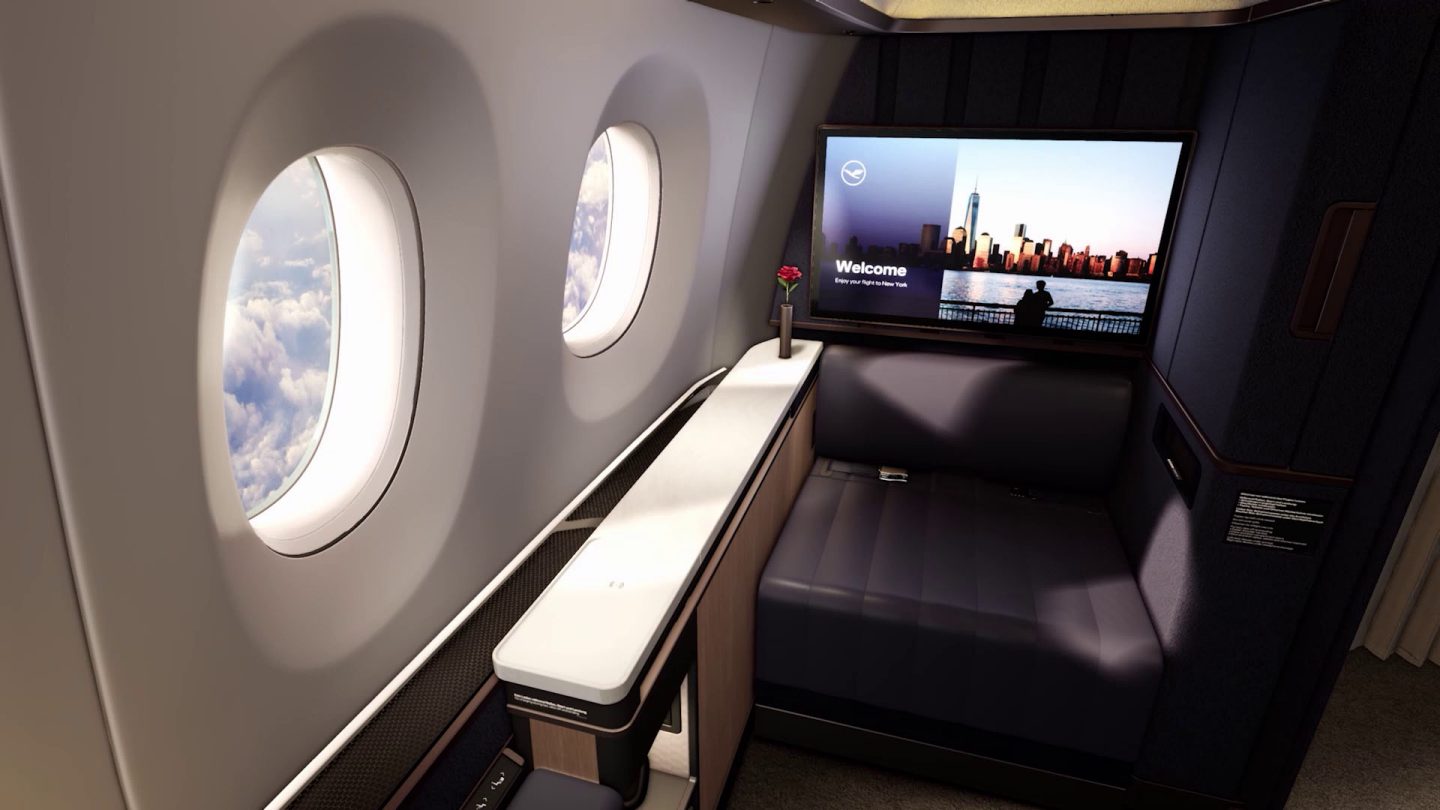 Experience Lufthansa First Class: private suite, cloud views & welcome screen to NYC.