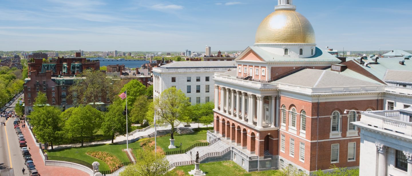 The Massachusetts State House with its golden dome in Boston on a sunny day