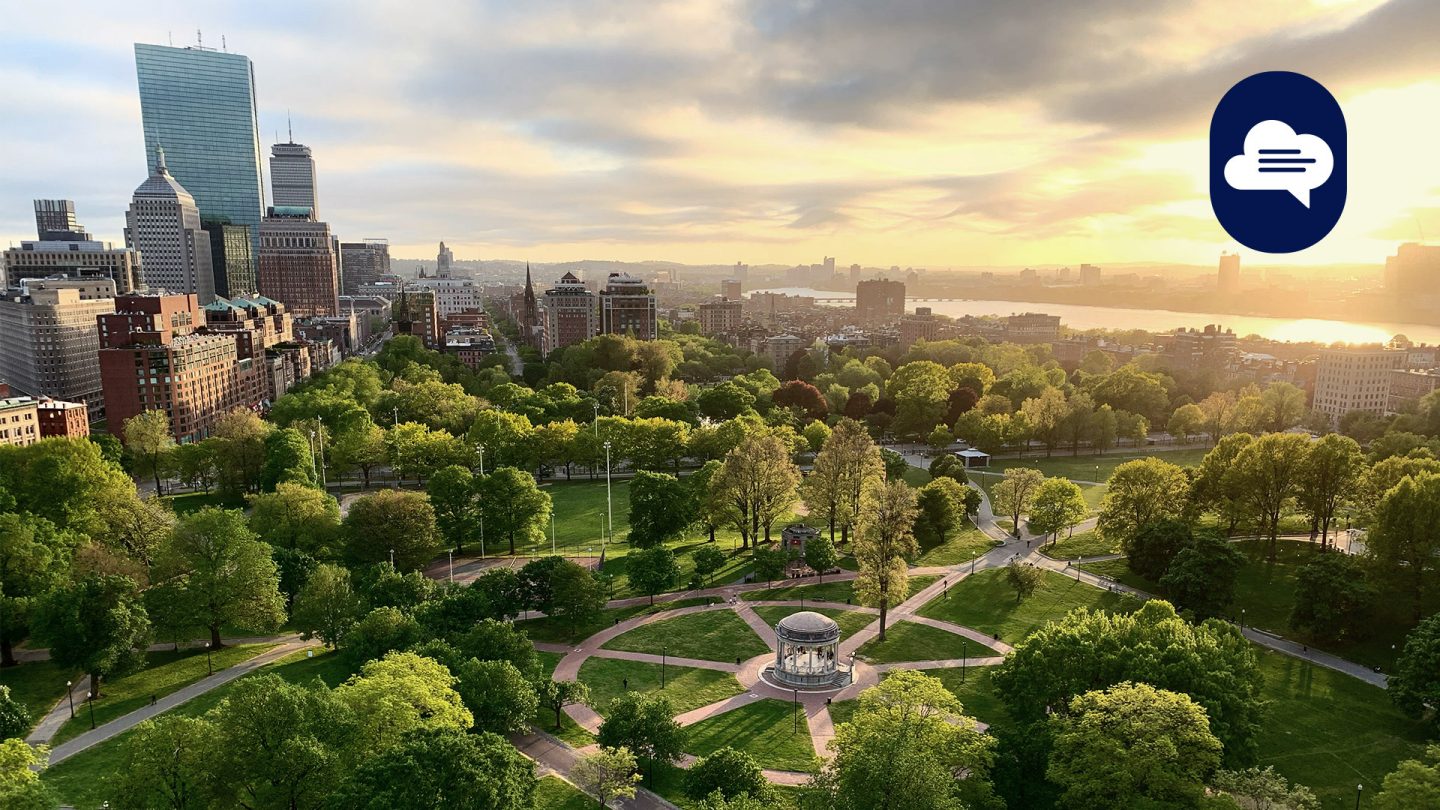 View over Boston Common park with the Boston skyline at sunset