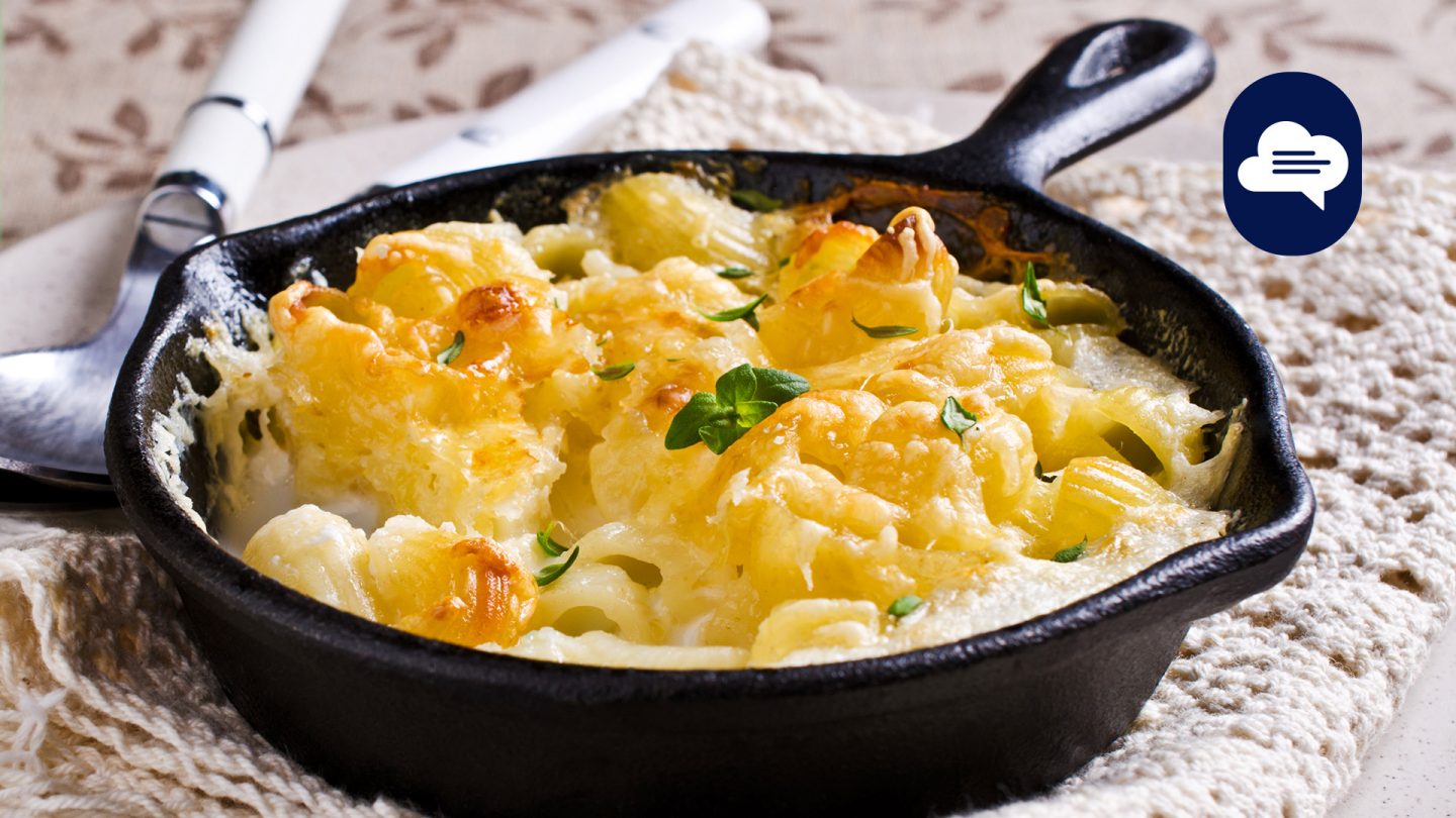 Team Stories: Cast iron frying pan with macaroni and cheese sauce