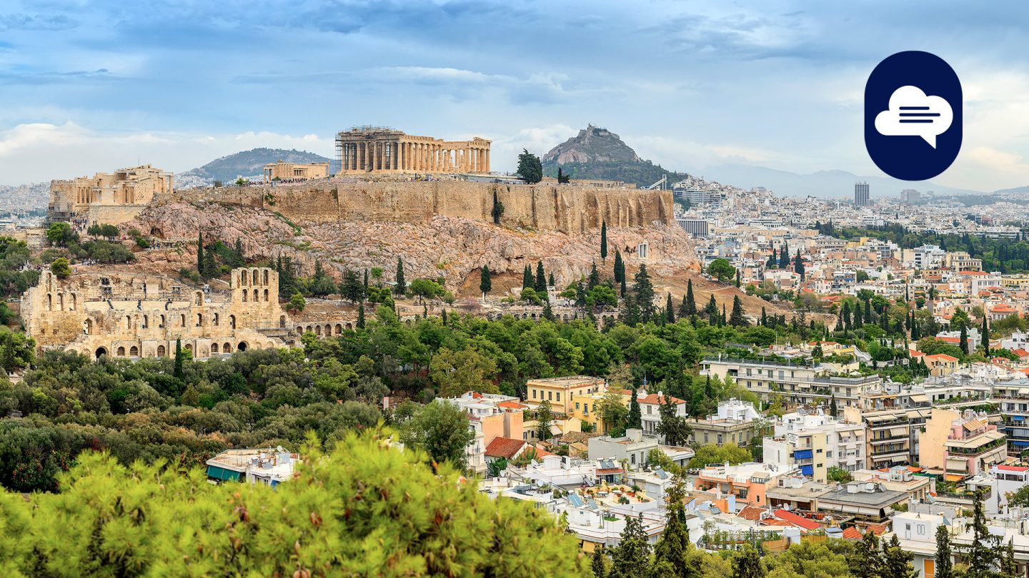 Team Stories: Aerial view of Athens with the Acropolis in the background.