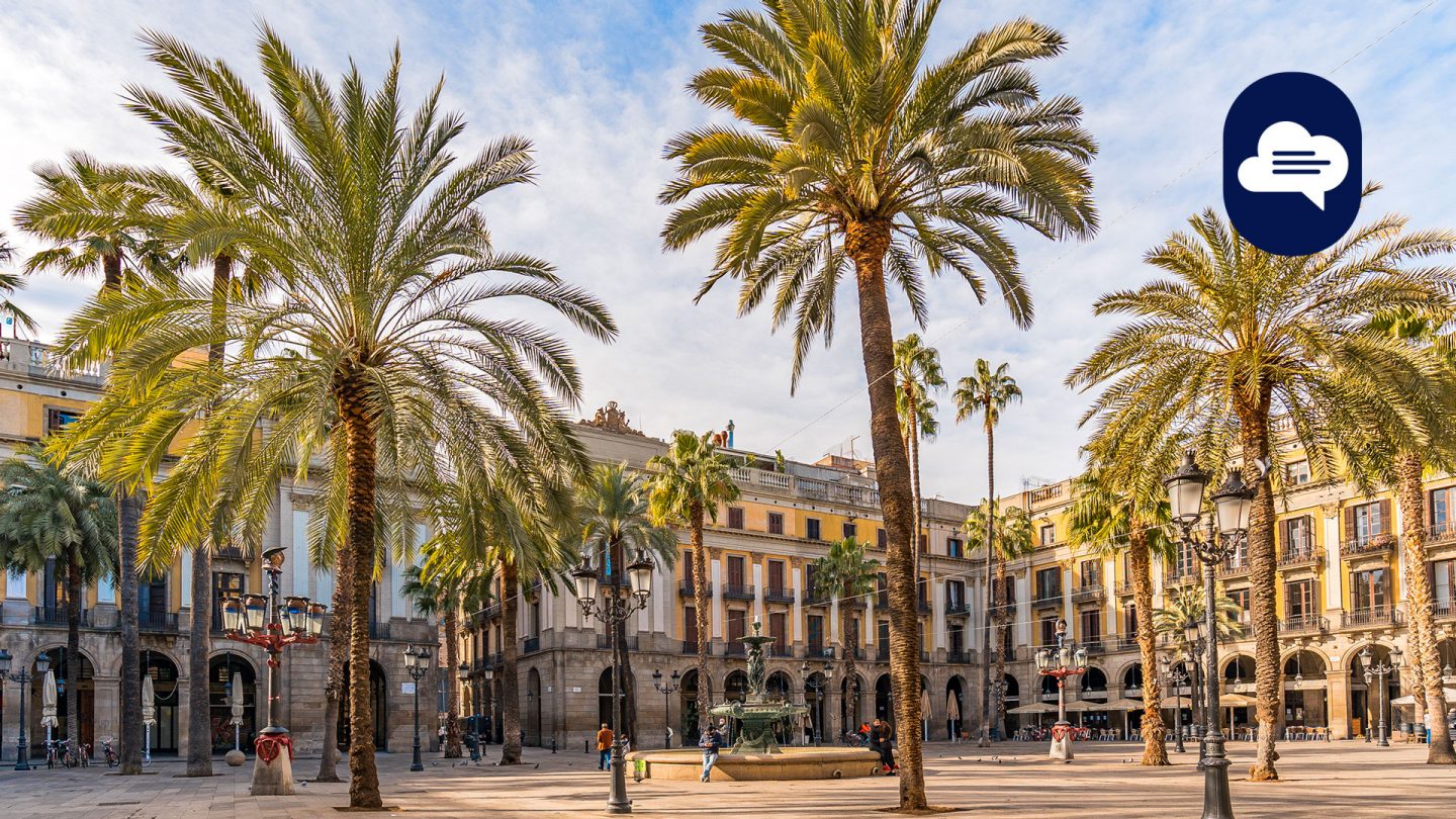 Team Stories: Plaça Reial in Barcelona with palm trees and arcades in morning light